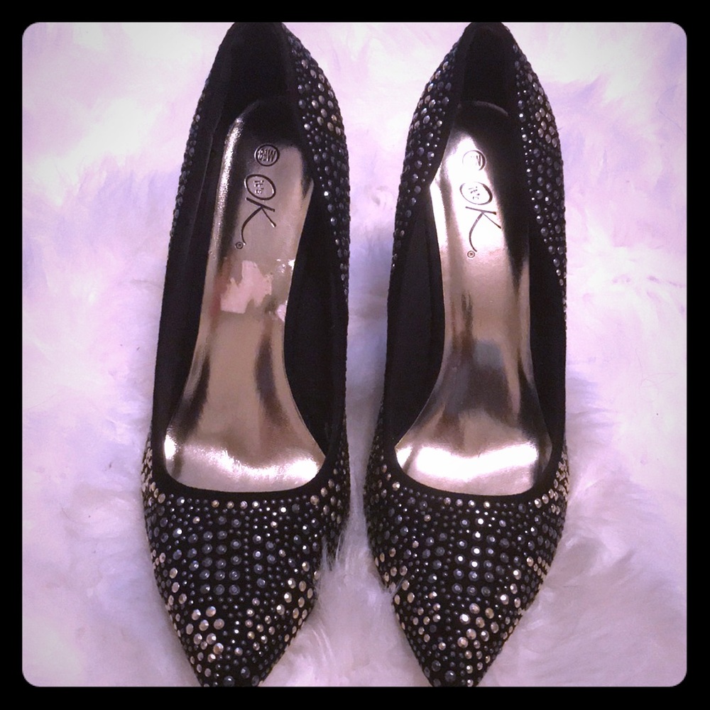 Black sequin closed toe heel . Size 8 1/2 .